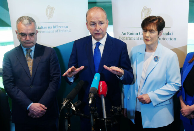taoiseach-micheal-martin-centre-minister-for-social-protection-dara-calleary-left-and-minister-for-children-norma-foley-right-speaking-to-the-media-as-they-attend-a-cost-of-disability-event-at