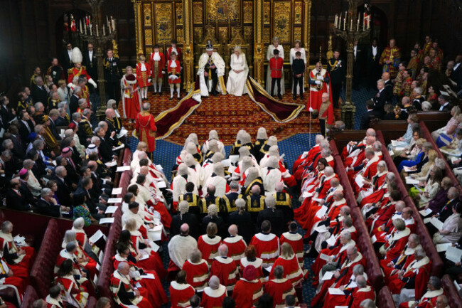 king-charles-iii-delivers-the-kings-speech-wearing-the-imperial-state-crown-and-the-robe-of-state-alongside-queen-camilla-wearing-the-george-iv-state-diadem-and-an-embroidered-gown-by-fiona-clare
