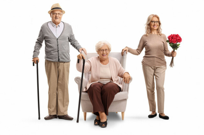 middle-aged-woman-with-her-elderly-parents-posing-together-isolated-on-white-background