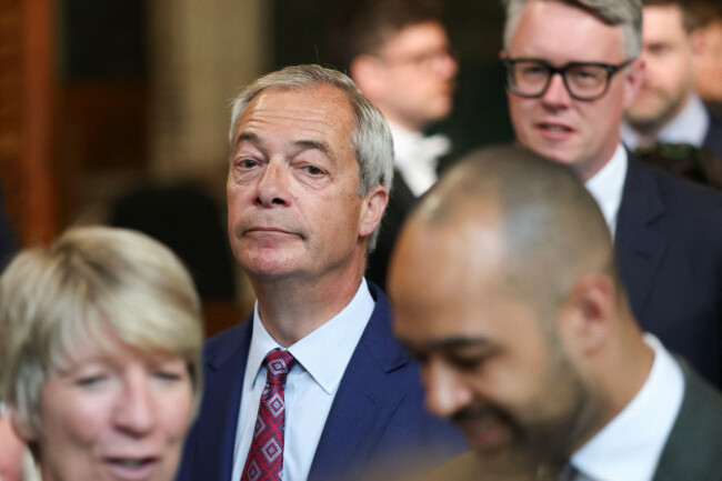 reform-uk-leader-nigel-farage-walks-through-the-members-lobby-of-the-houses-of-parliament-in-london-to-the-house-of-lords-to-hear-the-kings-speech-during-the-state-opening-of-parliament-picture-dat