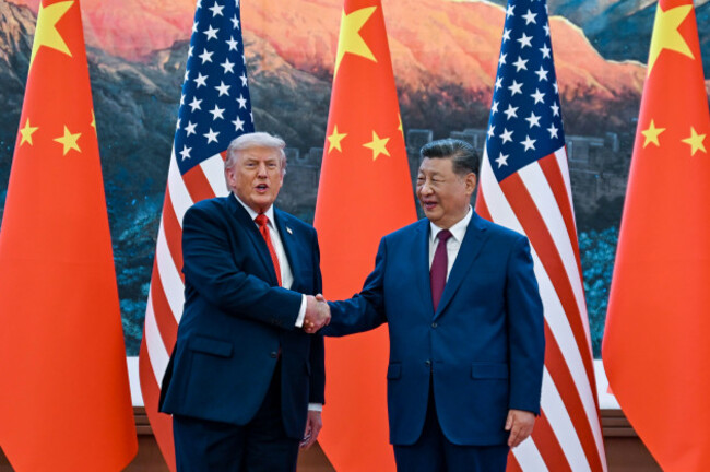 chinese-president-xi-jinping-right-shakes-hands-with-u-s-president-donald-trump-at-the-great-hall-of-the-people-in-beijing-thursday-may-14-2026-kenny-holstonpool-photo-via-ap