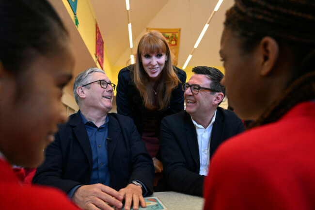 britains-prime-minister-keir-starmer-left-former-deputy-prime-minister-angela-rayner-and-manchester-mayor-andy-burnham-meet-with-school-children-at-a-primary-school-in-ashton-under-lyne-north-west