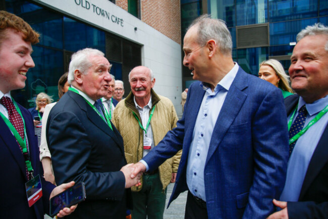 former-taoiseach-bertie-ahern-meets-and-shakes-hands-with-current-fianna-fail-leader-and-tanaiste-micheal-martin-as-he-arrives-at-the-fianna-fail-ard-fheis-at-the-dublin-royal-convention-centre-pict
