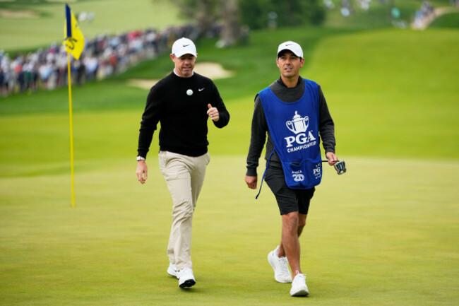rory-mcilroy-of-northern-ireland-walks-with-his-caddie-to-the-11th-hole-during-the-first-round-of-the-pga-championship-golf-tournament-practice-round-at-aronimink-golf-club-thursday-may-14-2026