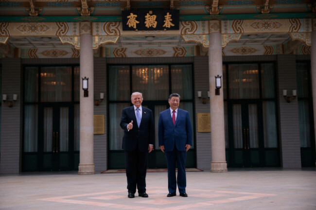 u-s-president-donald-trump-left-poses-for-a-picture-with-chinese-president-xi-jinping-during-a-visit-to-the-zhongnanhai-garden-in-beijing-friday-may-15-2026-evan-vuccipool-photo-via-ap