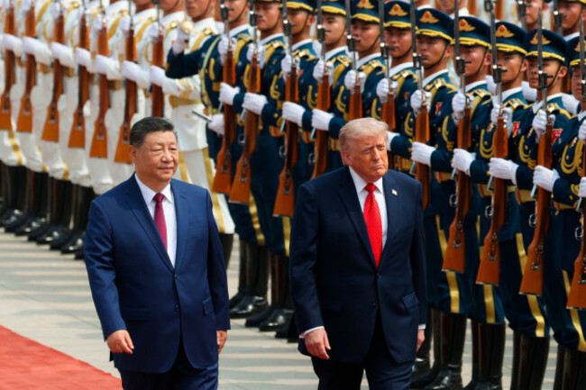 chinese-president-xi-jinping-inspects-an-honor-guard-with-u-s-president-donald-trump-during-a-welcome-ceremony-at-the-great-hall-of-the-people-in-beijing-thursday-may-14-2026-maxim-shemetovpool