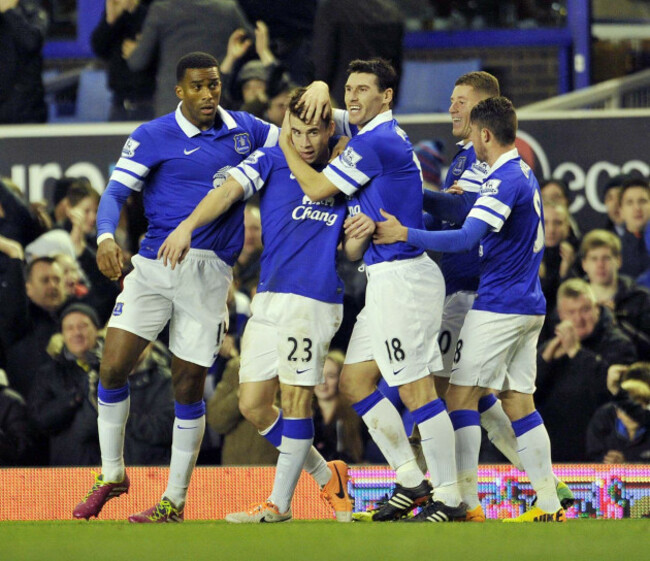 evertons-seamus-coleman-second-left-celebrates-with-his-teammates-sylvain-distin-left-and-gareth-barry-centre-right-after-he-scored-the-second-goal-of-the-game-for-his-side-during-their-english-pr