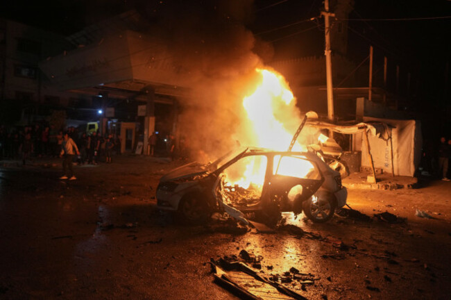 flames-engulf-a-vehicle-struck-by-an-israeli-strike-in-a-street-of-gaza-city-friday-may-15-2026-ap-photojehad-alshrafi