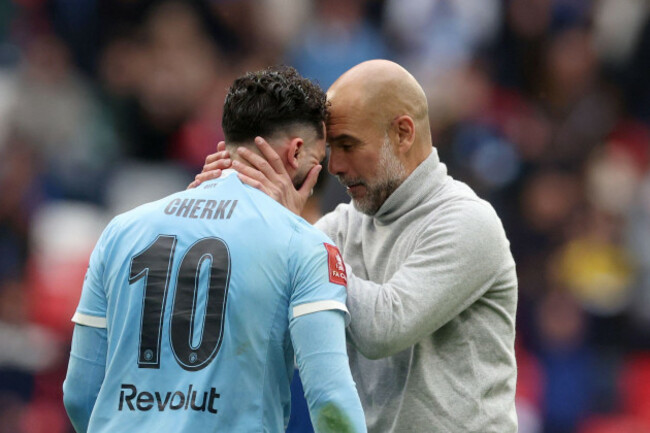 manchester-citys-head-coach-pep-guardiola-right-celebrates-with-manchester-citys-rayan-cherki-after-winning-the-english-fa-cup-final-soccer-match-between-chelsea-and-manchester-city-in-london-sat