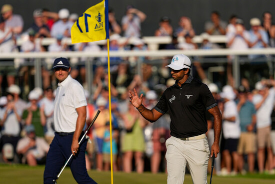 aaron-rai-of-england-waves-after-his-shot-on-the-17th-green-during-the-final-round-of-the-pga-championship-golf-tournament-at-aronimink-golf-club-sunday-may-17-2026-in-newtown-square-pa-ap-ph