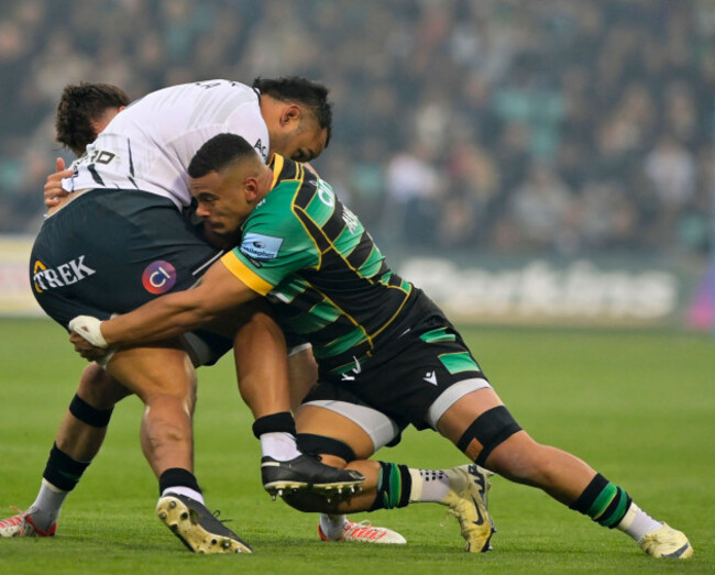 northampton-uk-31st-may-2024-billy-vunipola-of-saracens-taken-down-by-juarno-augustus-of-northampton-saints-during-the-gallagher-premiership-rugby-semi-final-match-between-northampton-saints-vs-sa