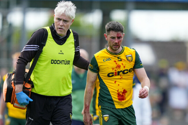 ryan-mchugh-with-the-team-doctor-at-half-time