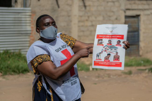 vanny-birungi-a-red-cross-volunteer-on-a-house-to-house-sensitisation-campaign-amid-the-ebola-outbreak-in-bunia-congo-monday-may-25-2026-ap-photomoses-sawasawa