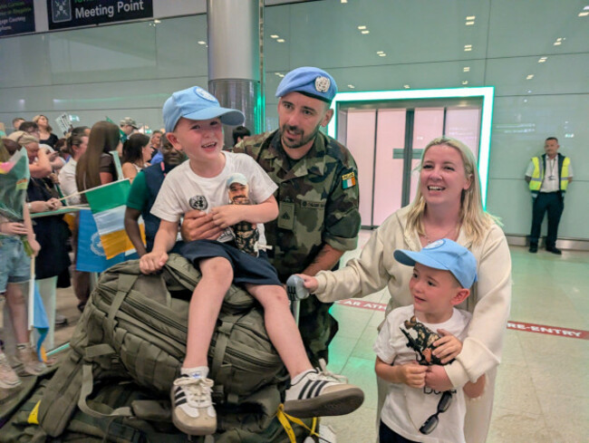 derek-forrester-and-nicola-byrne-with-caolan-and-cathal-forrester-at-dublin-airport-terminal-2-as-peacekeepers-from-the-127th-infantry-battalion-return-home-after-their-deployment-to-lebanon-as-part-o