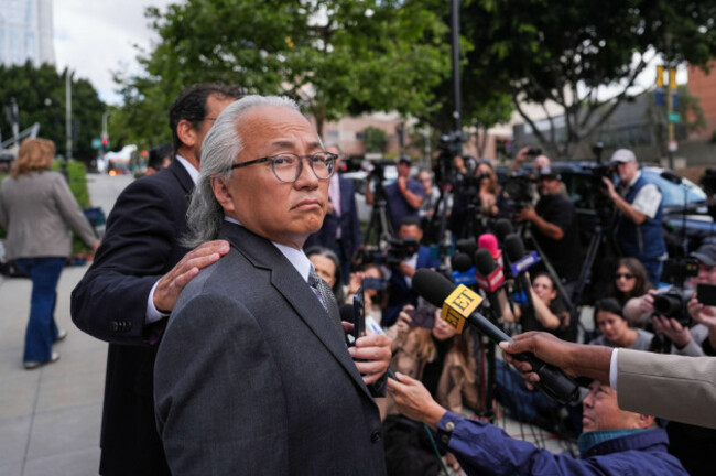 kenneth-iwamasa-one-of-five-people-who-pleaded-guilty-in-the-ketamine-overdose-death-of-actor-matthew-perry-looks-away-as-his-attorney-alan-eisner-talks-to-reporters-after-iwamasas-sentencing-in