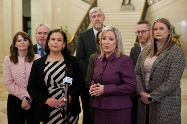 sinn-fein-president-mary-lou-mcdonald-front-left-and-first-minister-michelle-oneill-front-right-with-caoimhe-archibald-left-john-odowd-centre-back-and-philip-mcguigan-second-right-during