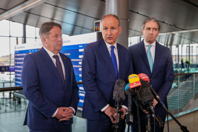 left-to-right-darragh-obrien-irelands-minister-for-transport-taoiseach-micheal-martin-and-irish-minister-for-finance-tanaiste-simon-harris-during-a-press-conference-giving-reaction-after-an-eve