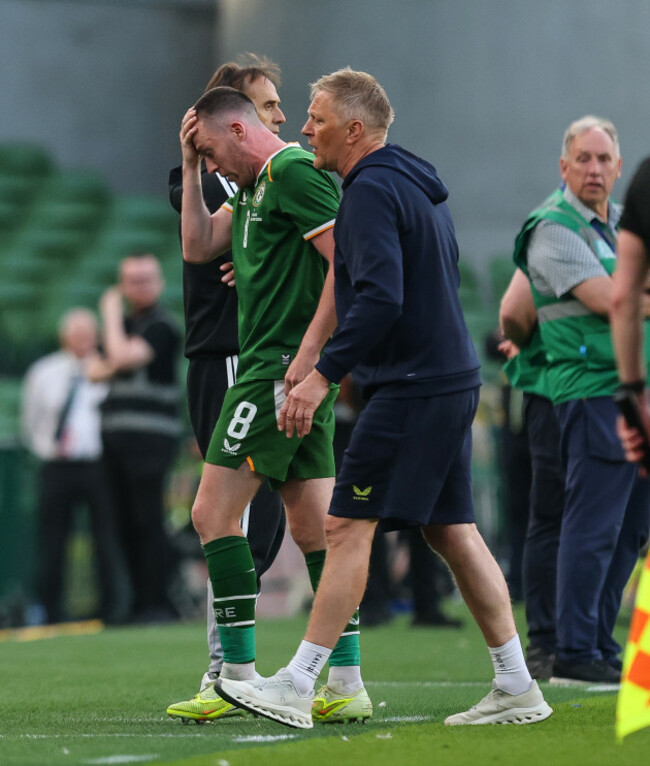 heimir-hallgrimsson-consoles-jack-moylan-after-he-received-a-red-card