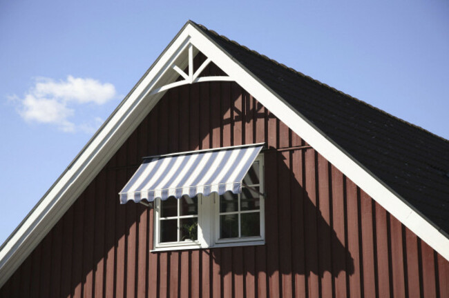 window-with-shed-red-walls-of-wood-sweden-no-property-release
