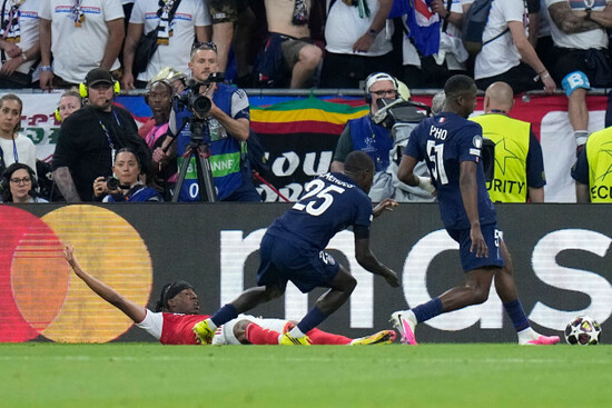 arsenals-noni-madueke-on-the-ground-complains-about-a-possible-foul-during-the-champions-league-final-soccer-match-between-paris-saint-germain-and-arsenal-in-budapest-hungary-saturday-may-30-20