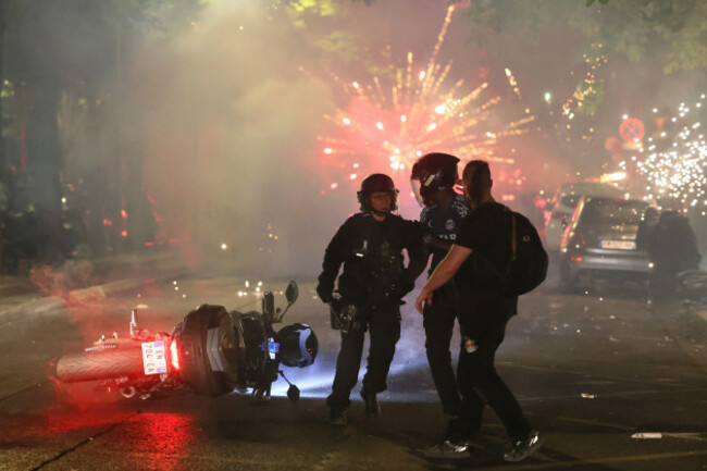 police-try-to-disperses-psg-supporters-who-left-off-fireworks-as-they-celebrate-in-paris-saturday-may-30-2026-after-the-champions-league-final-soccer-match-between-paris-saint-germain-and-arsenal-t