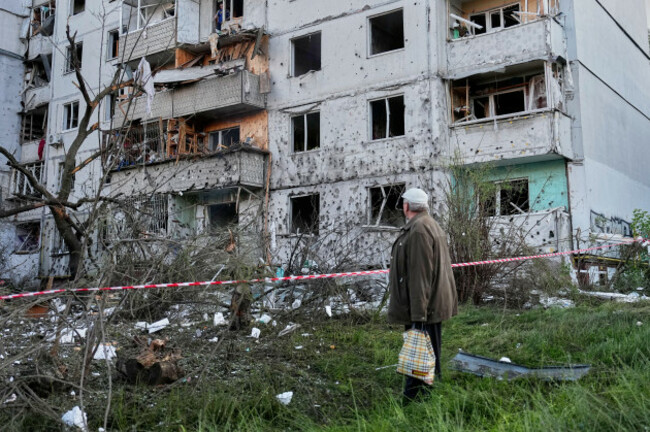 a-resident-looks-at-the-site-of-a-russian-missile-strike-that-hit-a-residential-building-in-kyiv-ukraine-tuesday-june-2-2026-ap-photoefrem-lukatsky