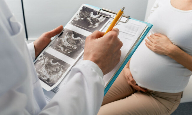 visit-to-obstetrician-gynecologist-by-pregnant-woman-for-scheduled-check-up-pregnancy-consultant