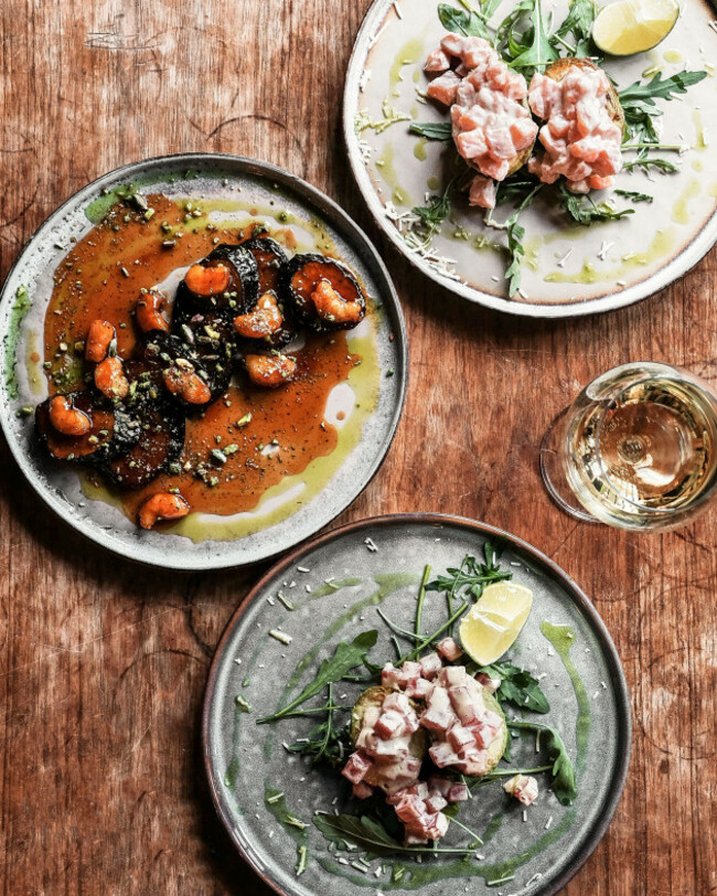 experience-the-art-of-elegant-plated-seafood-dishes-combined-beautifully-with-fresh-greens