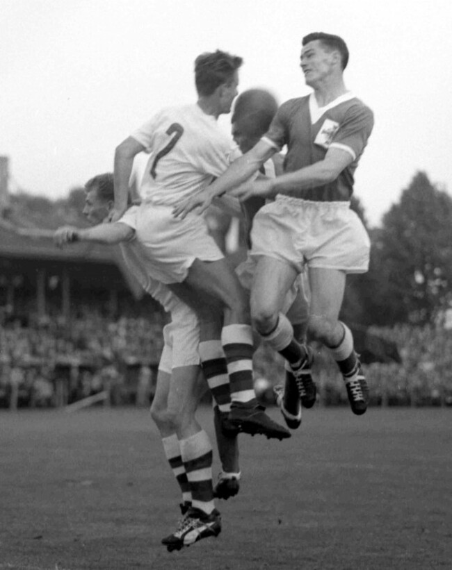 northern-irelands-forward-peter-mcparland-right-and-czechoslovakian-defender-gustav-mraz-left-jump-for-the-ball-with-two-other-players-during-the-football-world-cup-match-at-halmstad-sweden-o