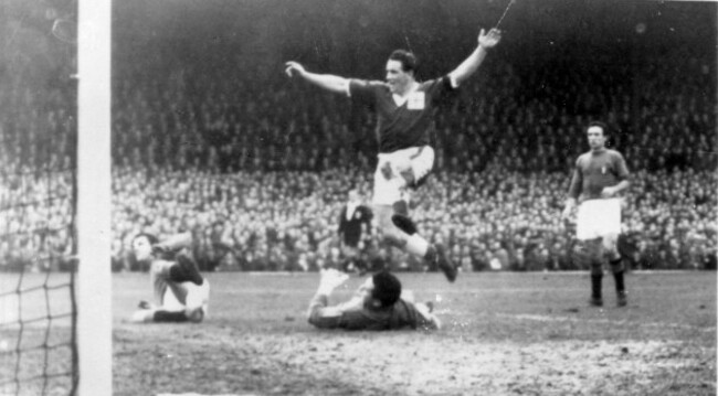 wilbur-cush-of-leeds-irelands-inside-right-flings-wide-his-arms-and-in-jubilation-jumps-over-the-fallen-italian-keeper-bugatti-after-scoring-his-teams-second-goal-in-their-2-1-victory-in