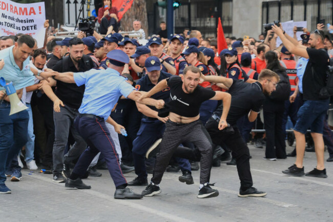protesters-scuffle-with-police-officers-blocking-a-street-during-a-demonstration-in-tirana-albania-wednesday-june-3-2026-opposing-a-luxury-coastal-development-project-linked-to-jared-kushner-and