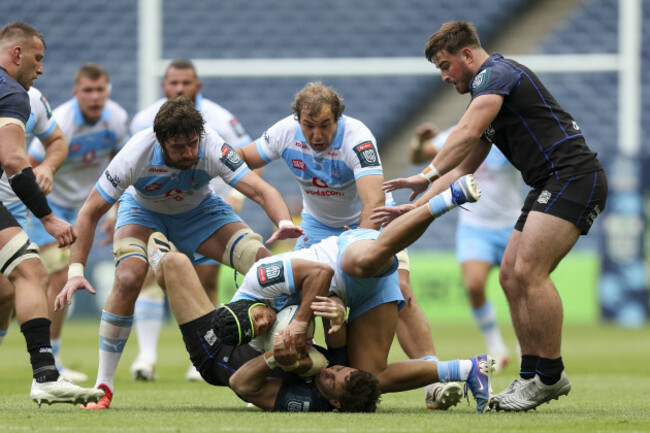 kurt-lee-arendse-is-tackled-by-josh-mckay