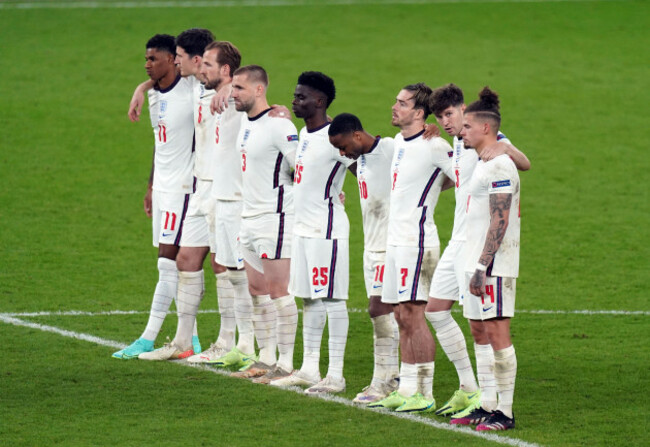 file-photo-dated-11-07-2021-of-englands-marcus-rashford-left-stands-dejected-with-team-mates-after-missing-from-the-penalty-spot-three-years-on-from-the-agonising-penalty-shoot-out-defeat-to-italy