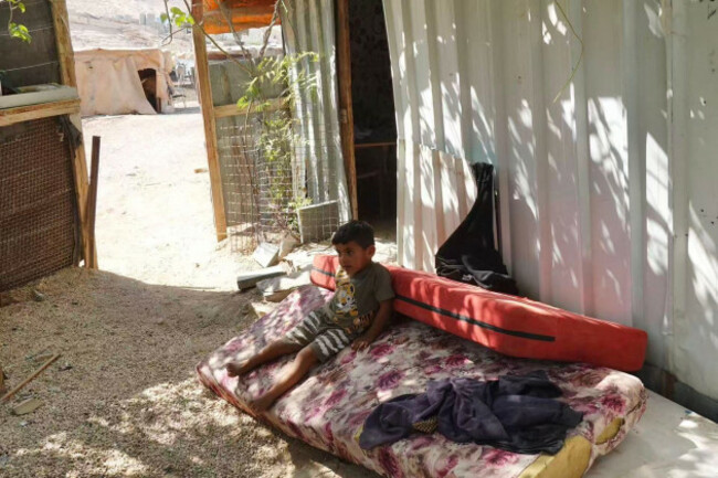 jerusalem-26th-aug-2025-a-palestinian-child-is-seen-on-aug-26-2025-at-a-palestinian-bedouin-community-in-the-e1-area-near-the-israeli-settlement-of-maale-adumim-in-the-west-bank-to-go-with-fea