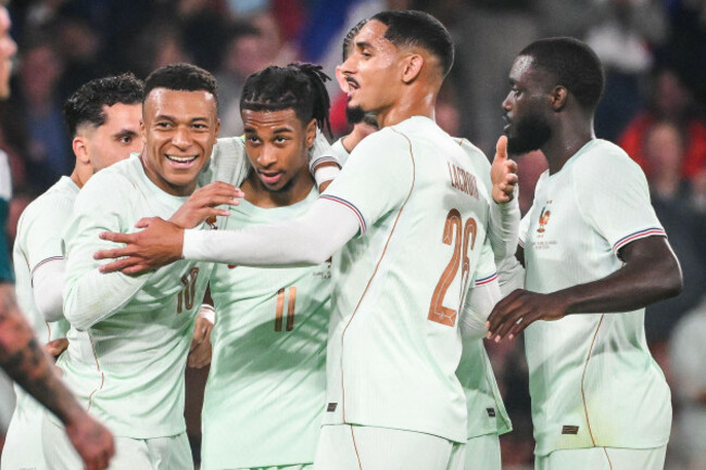 june-8-2026-villeneuve-dascq-france-france-michael-olise-of-france-celebrate-his-goal-with-teammates-during-the-international-friendly-football-match-between-france-and-northern-ireland-at-pierr
