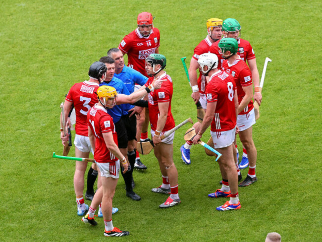 james-owens-with-cork-players-after-the-final-whistle