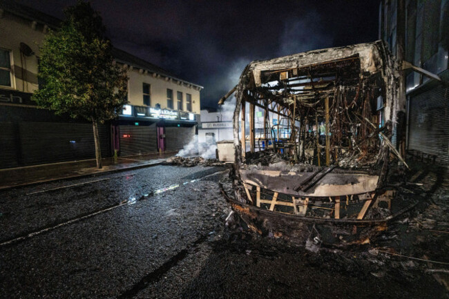 belfast-antrim-uk-9th-june-2026-a-burnt-out-bus-seen-after-an-anti-immigration-protest-belfast-erupted-into-flames-as-locals-took-to-the-streets-to-protest-against-the-stabbing-of-a-north-belfas