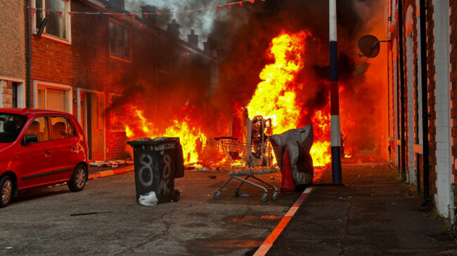 vehicles-set-on-fire-by-protesters-on-lendrick-street-in-belfast-as-disorder-flared-in-response-to-monday-nights-stabbing-attack-in-the-city-a-30-year-old-man-arrested-in-connection-with-the-belfas