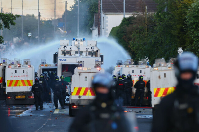 police-use-water-cannons-to-disperse-protesters-near-newtownabbey-in-belfast-northern-ireland-wednesday-june-10-2026-following-a-stabbing-incident-on-monday-night-ap-photopeter-morrison
