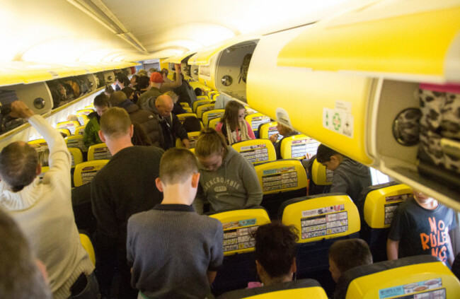 people-standing-up-upon-landing-on-ryanair-flight-image-shot-2013-exact-date-unknown