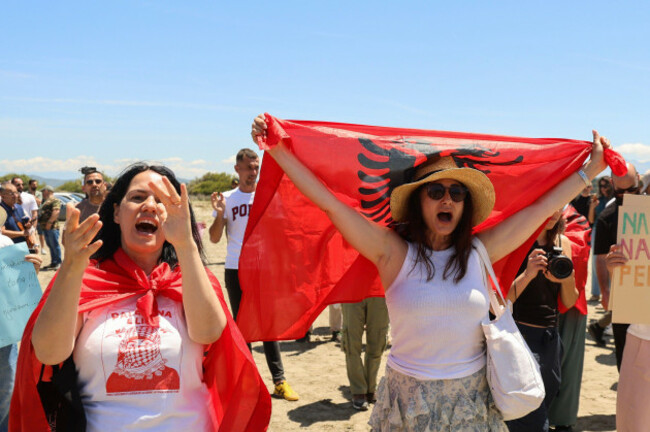 protesters-chant-slogans-during-a-protest-rally-against-the-construction-of-a-massive-coastal-development-project-linked-to-jared-kushner-and-ivanka-trump-at-narta-lagoon-area-western-albania-satur