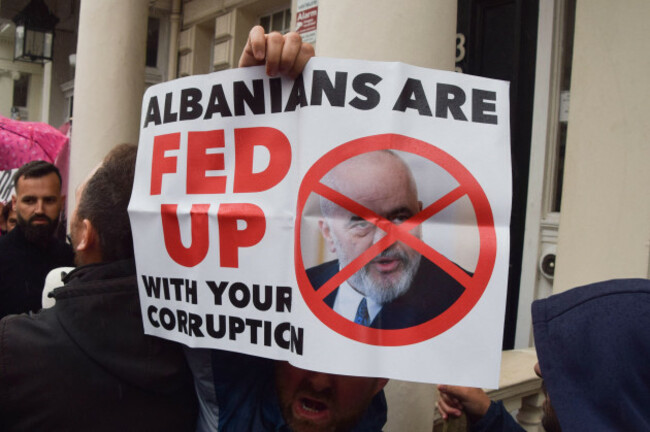 london-england-uk-6th-june-2026-a-protester-holds-a-sign-opposed-to-prime-minister-of-albania-edi-rama-as-members-of-the-albanian-diaspora-gather-outside-the-albanian-embassy-in-london-in-protest