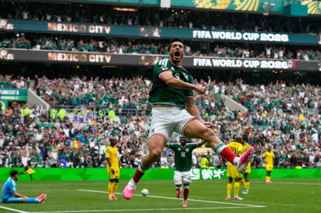 mexicos-raul-jimenez-celebrates-after-scoring-his-sides-second-goal-during-the-world-cup-group-a-soccer-match-between-mexico-and-south-africa-in-mexico-city-thursday-june-11-2026-ap-photonatac
