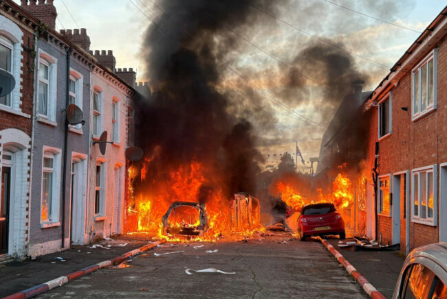 vehicles-set-on-fire-by-protesters-on-lendrick-street-in-belfast-as-disorder-flared-in-response-to-monday-nights-stabbing-attack-in-the-city-a-30-year-old-man-arrested-in-connection-with-the-belfas