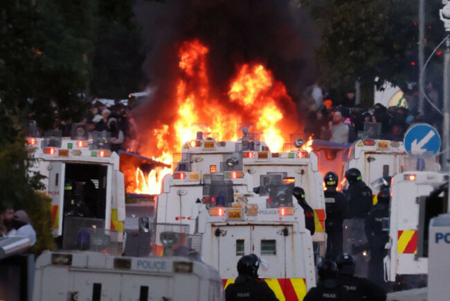 protesters-set-fire-to-a-barricade-as-police-block-antrim-road-at-the-sandyknowes-roundabout-in-newtownabbey-picture-date-wednesday-june-10-2026