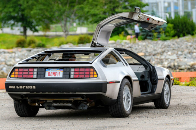 saint-john-nb-canada-july-18-2021-a-dmc-delorean-parked-with-passenger-door-open-license-plate-reads-88mph-from-the-movie-back-to-the-future