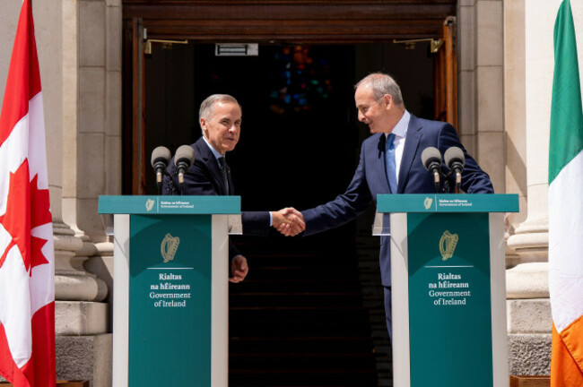 prime-minister-mark-carney-left-shakes-hands-with-micheal-martin-irelands-head-of-government-after-giving-remarks-at-the-government-buildings-in-dublin-on-saturday-june-13-2026-christopher-k