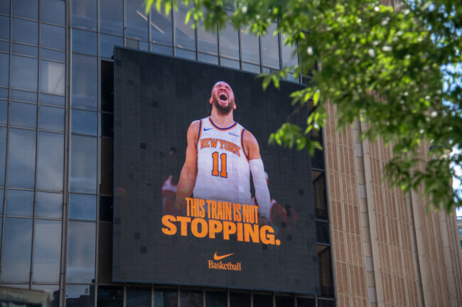 new-york-ny-may-31-a-general-view-of-a-nike-basketball-digital-billboard-with-this-train-is-not-stopping-and-an-image-of-new-york-knicks-guard-jalen-brunson-on-the-exterior-of-madison-square-gar