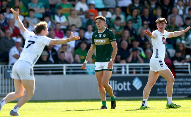 brian-byrne-and-colm-dalton-wave-for-a-point-awarded-to-david-clifford