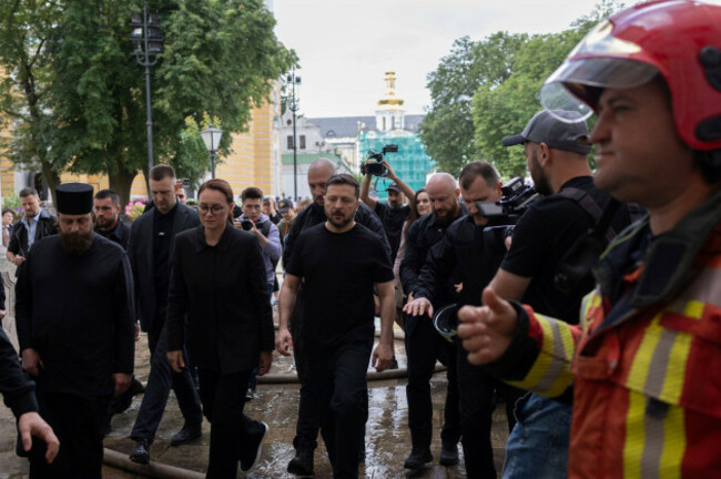 accompanied-by-ukrainian-prime-minister-yulia-svyrydenko-center-left-president-volodymyr-zelenskyy-center-inspects-the-damage-caused-by-a-russian-drone-strike-at-the-dormition-cathedral-of-the-kyi